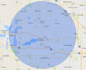 Map showing a 25-mile radius around a central point in a city area.